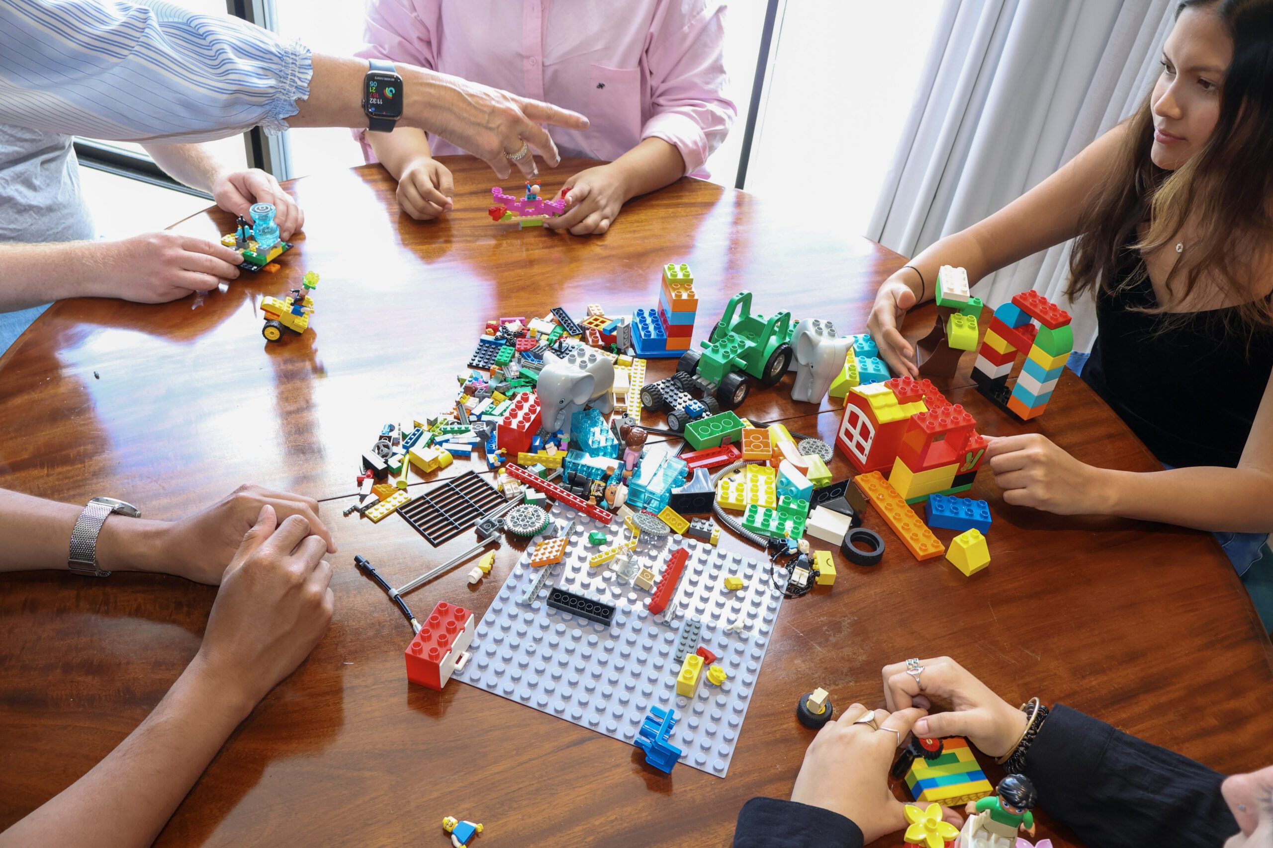 A close-up of a complex LEGO model built during a certification workshop.