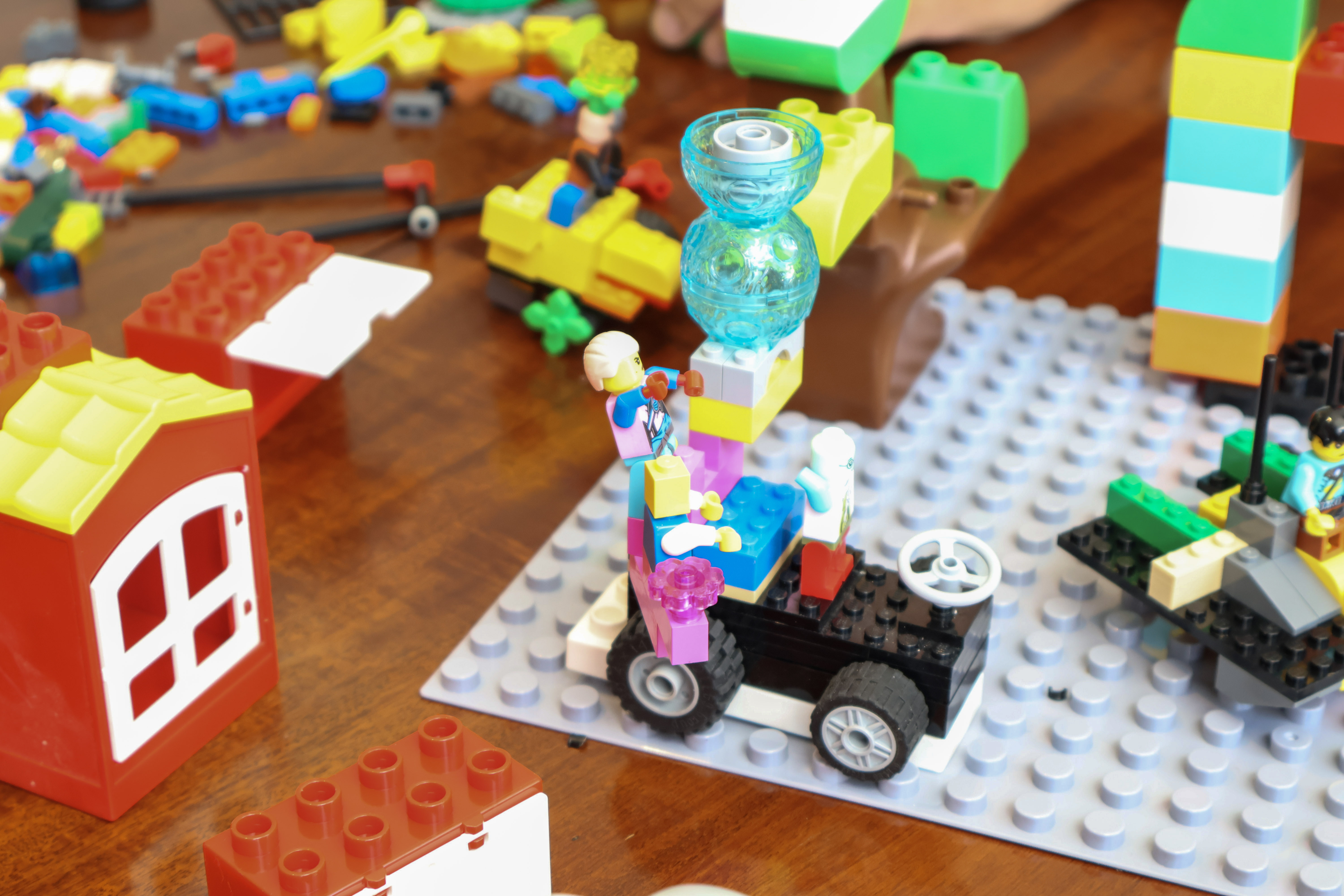 A LEGO model visualizing interconnected risks in a business system.