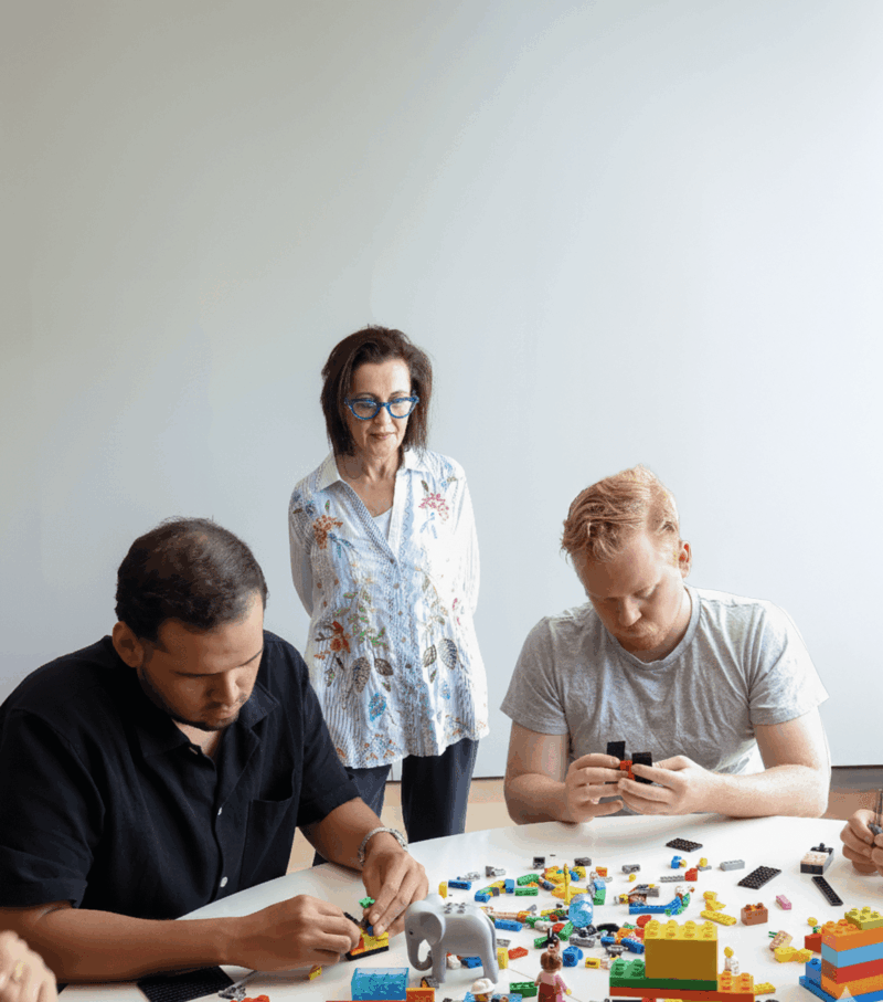 A team collaborating in a LEGO Serious Play workshop