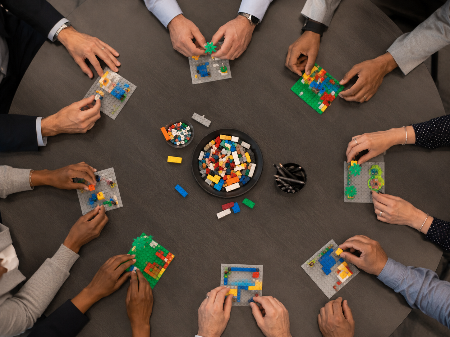 LEGO SERIOUS PLAY participation workshop with leaders building individual models